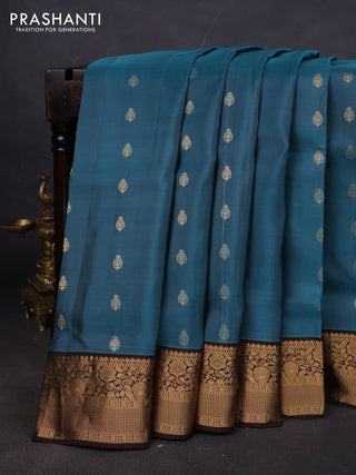Pure soft silk saree pastel blue shade and brown with allover zari woven buttas and zari woven floral border
