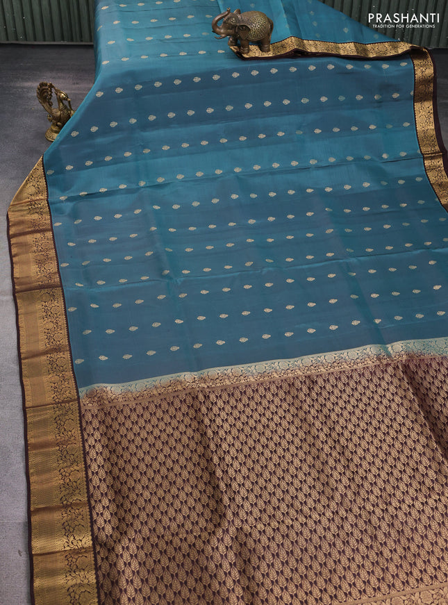 Pure soft silk saree pastel blue shade and brown with allover zari woven buttas and zari woven floral border