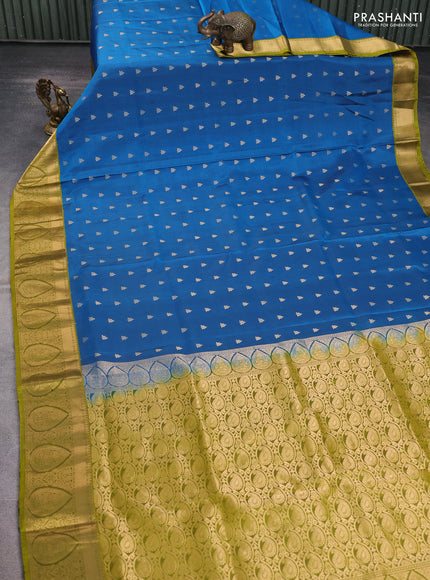 Pure soft silk saree cs blue and mehendi green with allover zari woven buttas and rich zari woven border