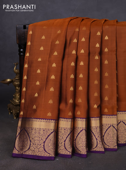 Pure soft silk saree rust shade and purple with allover zari woven buttas and rich zari woven border