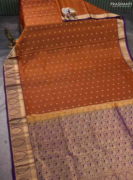 Pure soft silk saree rust shade and purple with allover zari woven buttas and rich zari woven border