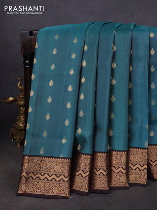 Pure soft silk saree pastel shade of blue and coffee brown with allover zari woven buttas and zari woven border