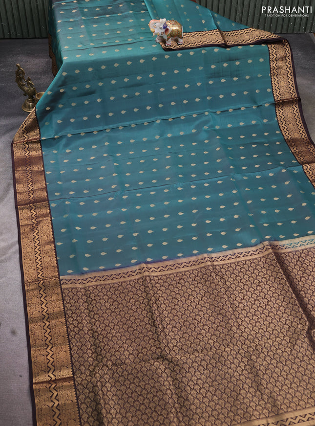 Pure soft silk saree pastel shade of blue and coffee brown with allover zari woven buttas and zari woven border