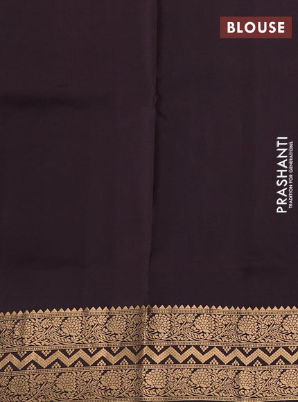 Pure soft silk saree pastel shade of blue and coffee brown with allover zari woven buttas and zari woven border