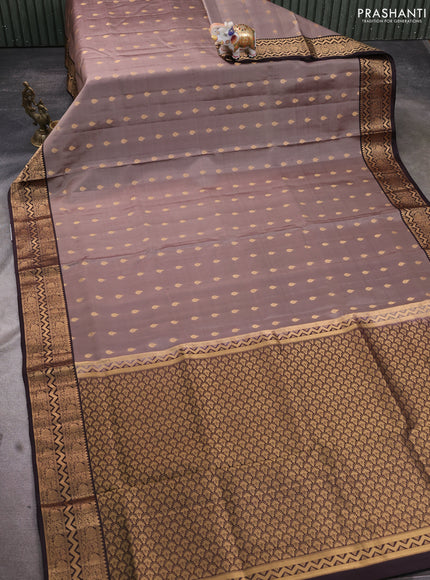 Pure soft silk saree pastel brown and coffee brown with allover zari woven buttas and zari woven border