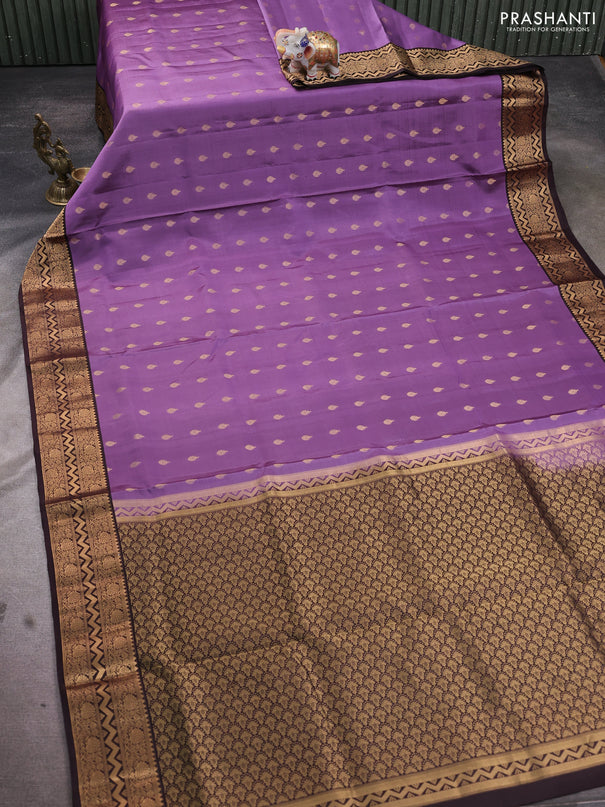 Pure soft silk saree pastel purple and coffee brown with allover zari woven buttas and zari woven border