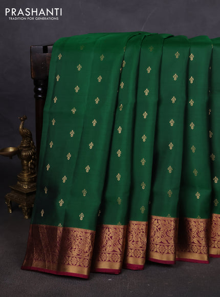 Pure soft silk saree green and dark magenta pink with allover zari woven buttas and zari woven floral border