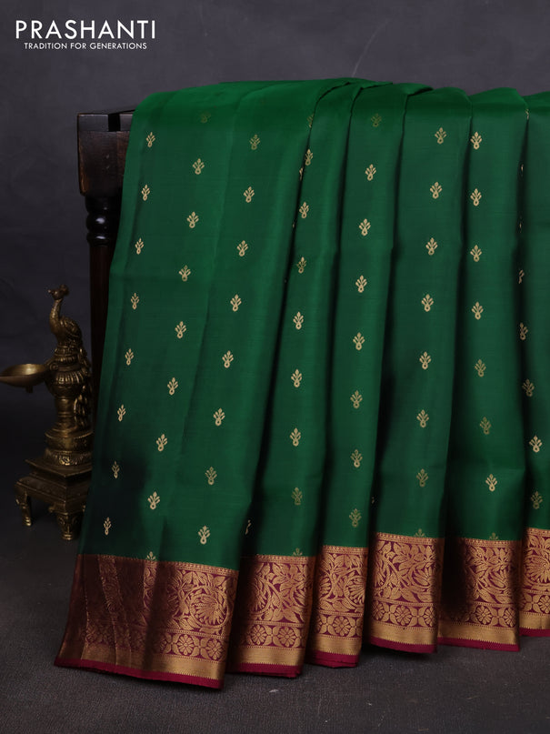 Pure soft silk saree green and dark magenta pink with allover zari woven buttas and zari woven floral border