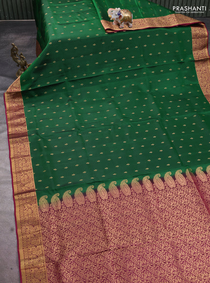 Pure soft silk saree green and dark magenta pink with allover zari woven buttas and zari woven floral border