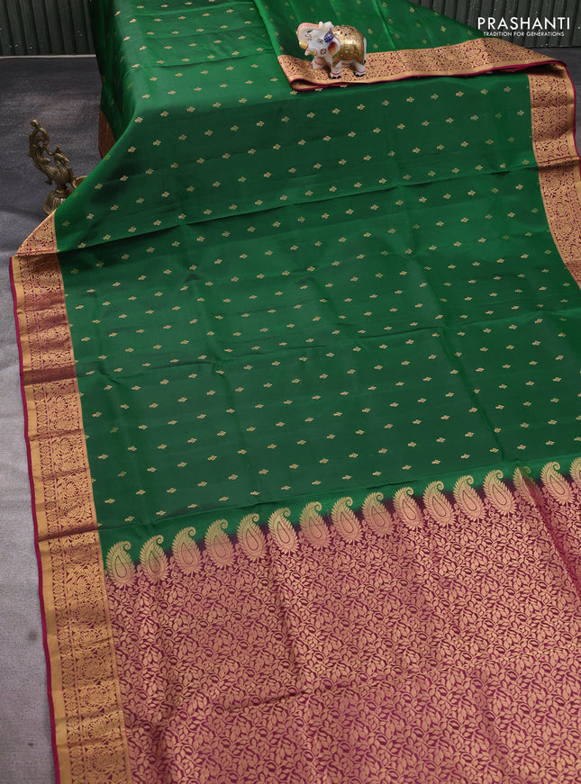 Pure soft silk saree green and dark magenta pink with allover zari woven buttas and zari woven floral border