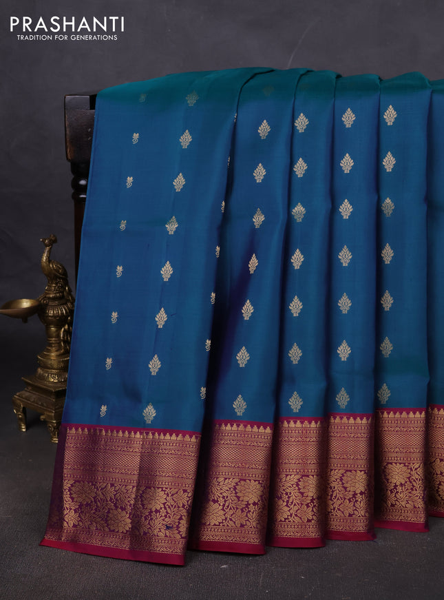 Pure soft silk saree dual shade of peacock green and dark magenta pink with allover zari woven buttas and zari woven floral border