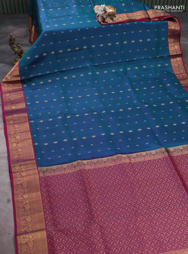 Pure soft silk saree dual shade of peacock green and dark magenta pink with allover zari woven buttas and zari woven floral border