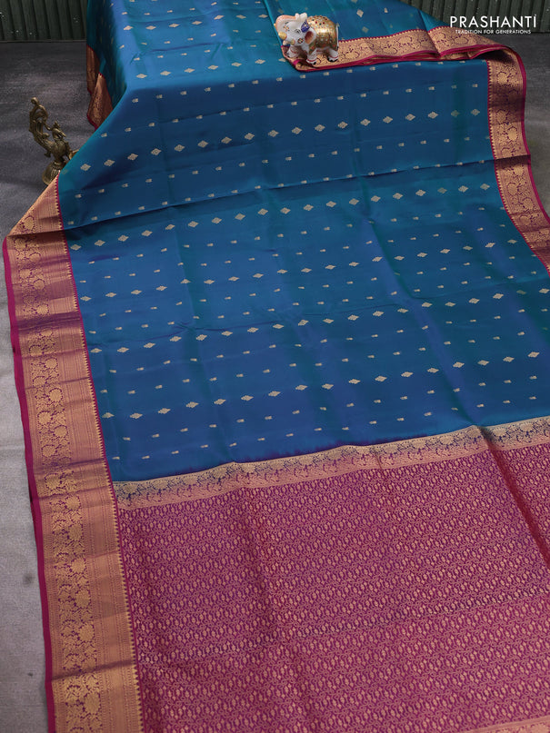 Pure soft silk saree dual shade of peacock green and dark magenta pink with allover zari woven buttas and zari woven floral border