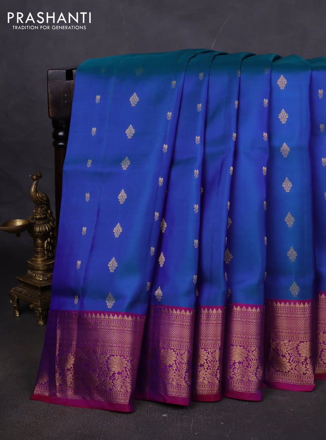 Pure soft silk saree dual shade of bluish green and dual shade of purple with allover zari woven buttas and zari woven floral border