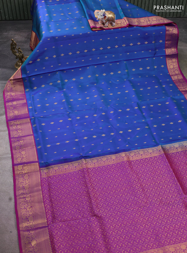Pure soft silk saree dual shade of bluish green and dual shade of purple with allover zari woven buttas and zari woven floral border