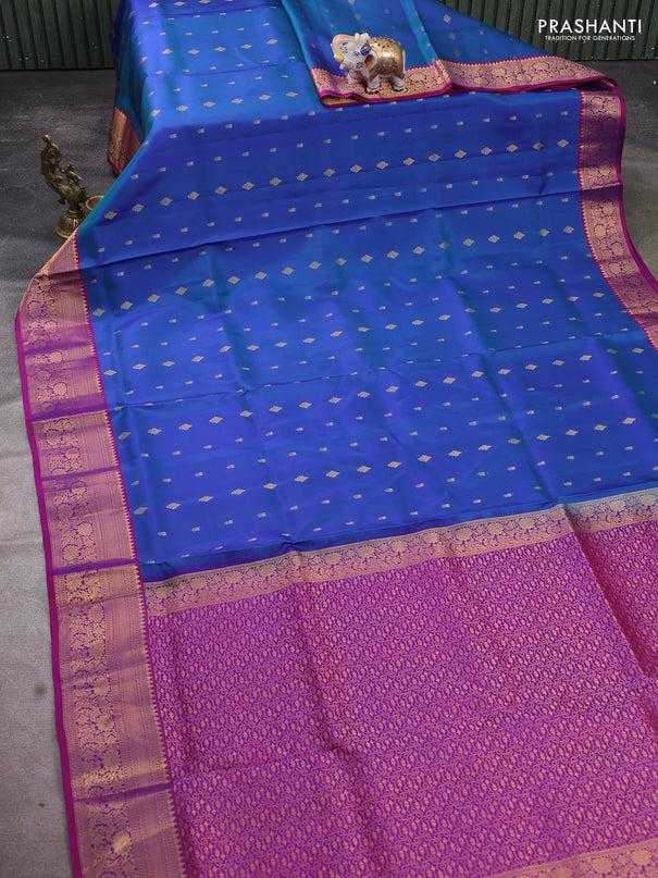 Pure soft silk saree dual shade of bluish green and dual shade of purple with allover zari woven buttas and zari woven floral border