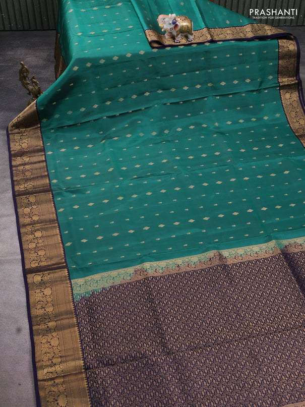 Pure soft silk saree teal green and navy blue with allover zari woven buttas and zari woven floral border