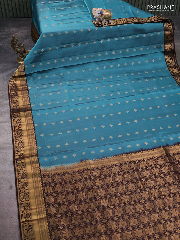 Pure soft silk saree pastel blue and coffee brown with allover zari woven buttas and zari woven border