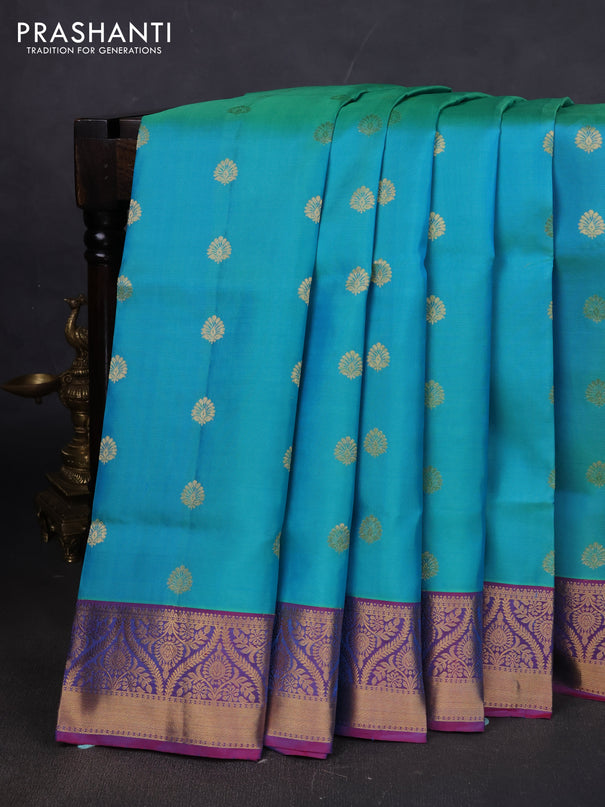 Pure soft silk saree teal blue shade and magenta pink with allover zari woven buttas and zari woven border