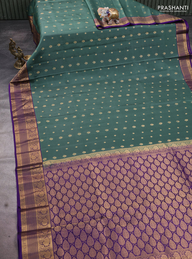 Pure soft silk saree pastel green and violet with allover zari woven buttas and floral zari woven border