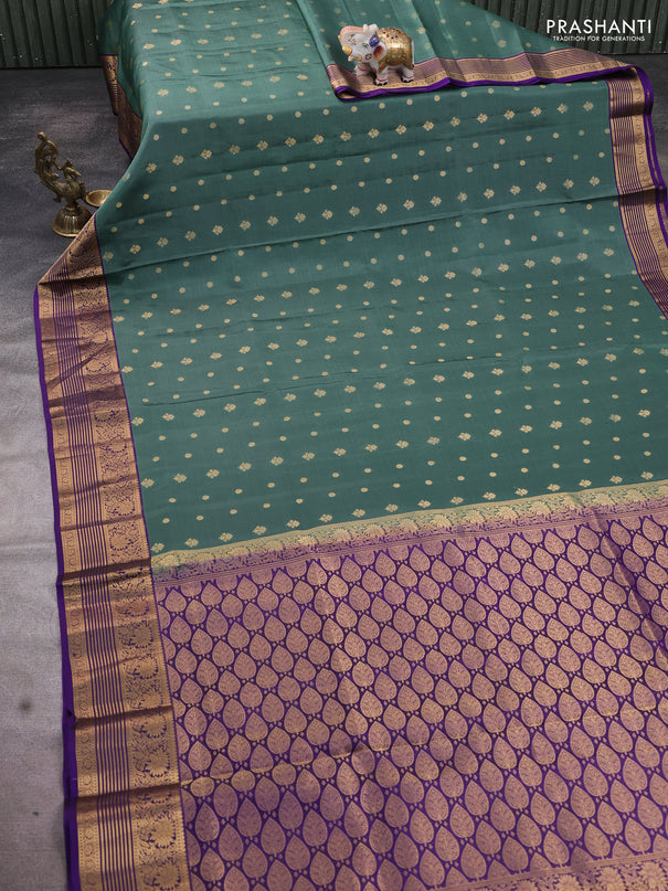 Pure soft silk saree pastel green and violet with allover zari woven buttas and floral zari woven border