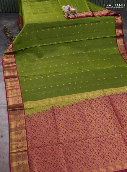 Pure soft silk saree mehendi green and dark pink with allover zari woven buttas and elephant zari woven border