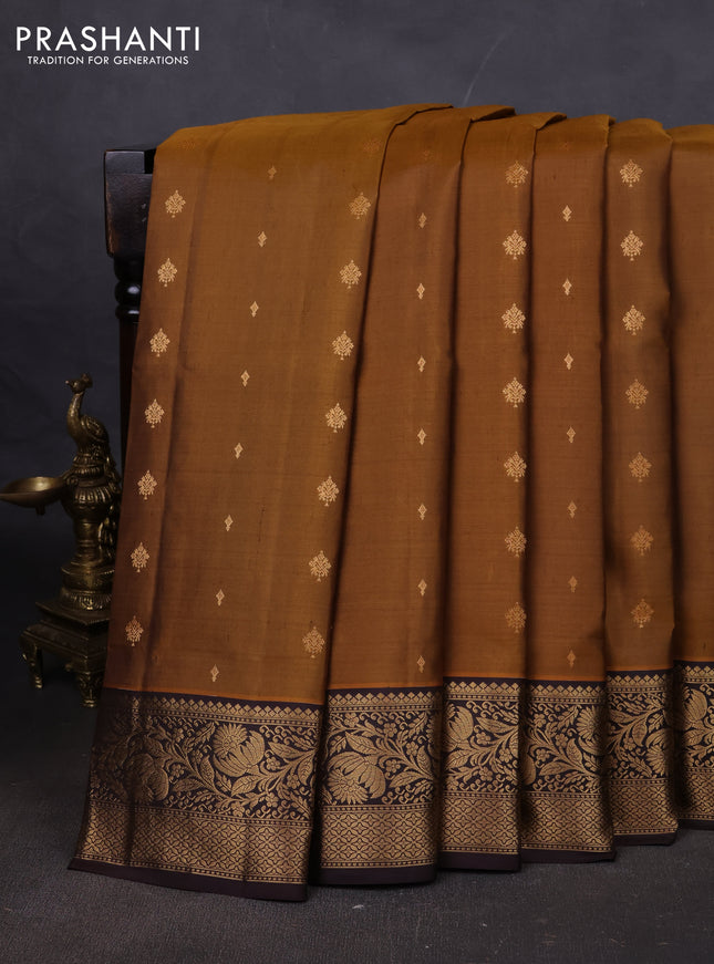 Pure soft silk saree dark mustard and coffee brown with allover zari woven buttas and rich zari woven floral border