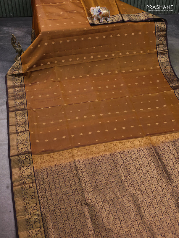 Pure soft silk saree dark mustard and coffee brown with allover zari woven buttas and rich zari woven floral border
