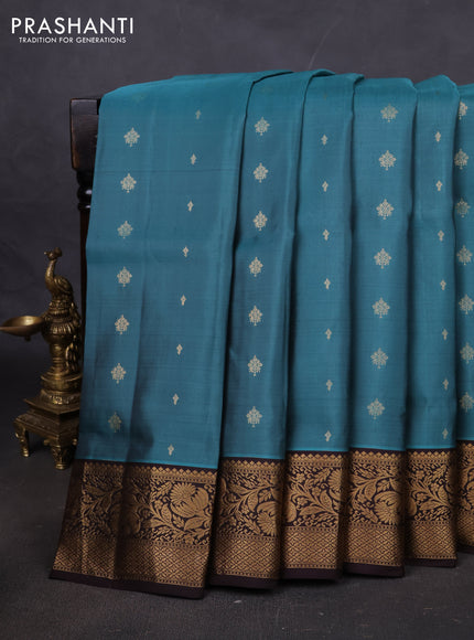 Pure soft silk saree teal greenshade and coffee brown with allover zari woven buttas and rich zari woven floral border
