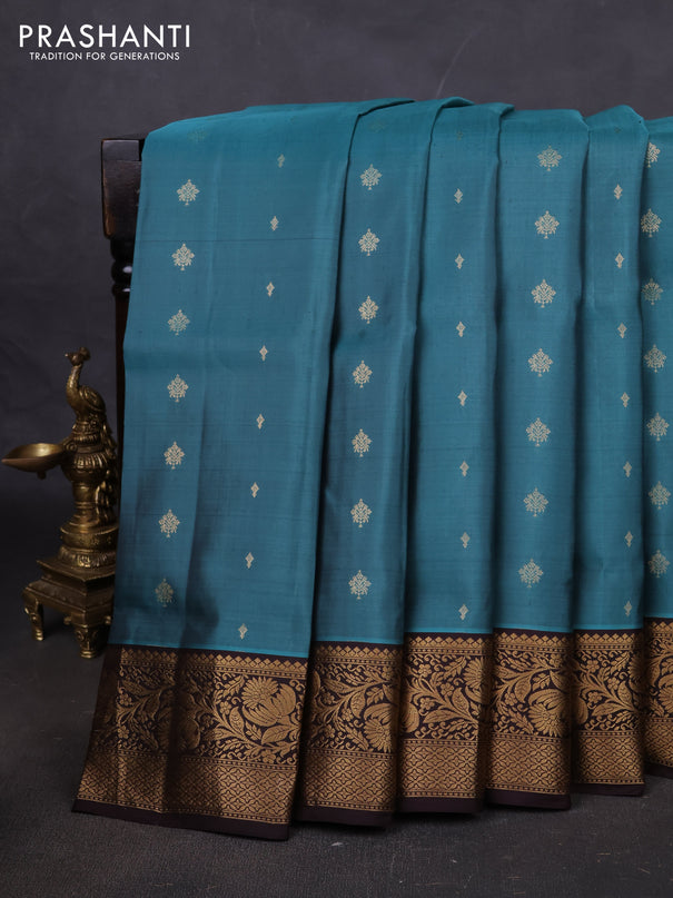 Pure soft silk saree teal greenshade and coffee brown with allover zari woven buttas and rich zari woven floral border
