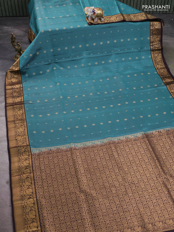 Pure soft silk saree teal greenshade and coffee brown with allover zari woven buttas and rich zari woven floral border