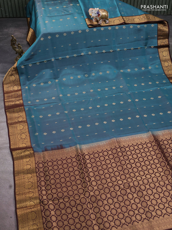 Pure soft silk saree teal blue shade and coffee brown with allover zari woven buttas and rich zari woven border