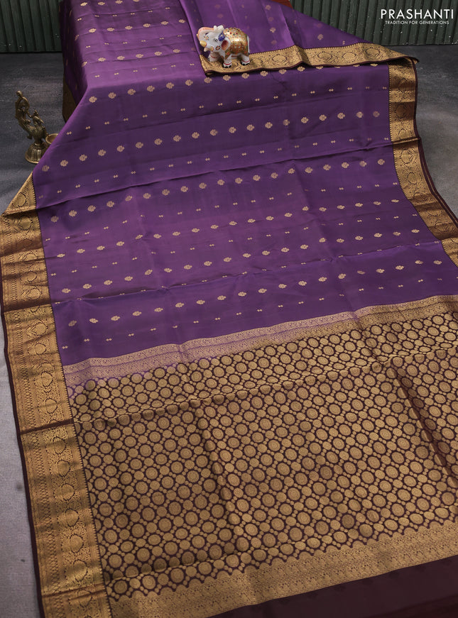 Pure soft silk saree purple shade and brown with allover zari woven buttas and rich zari woven border