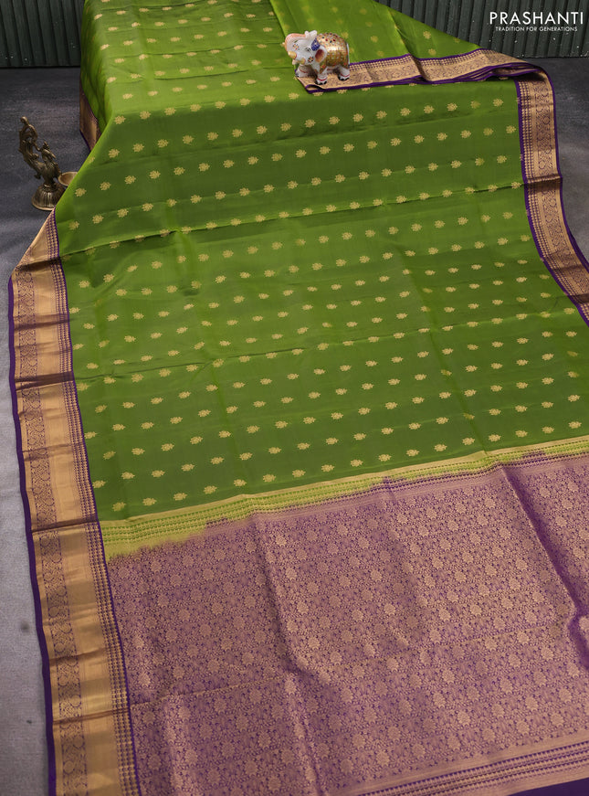 Pure soft silk saree sap green and violet with allover zari woven buttas and rich zari woven border