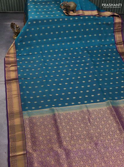 Pure soft silk saree peacock green and violet with allover zari woven buttas and rich zari woven border