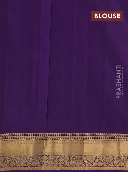 Pure soft silk saree peacock green and violet with allover zari woven buttas and rich zari woven border
