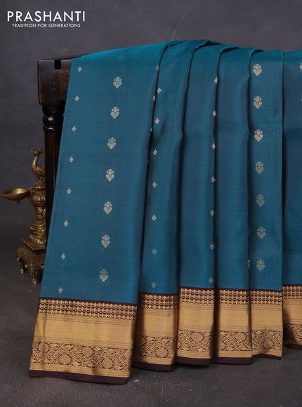 Pure soft silk saree peacock green and coffee brown with allover zari woven buttas and rich zari woven border