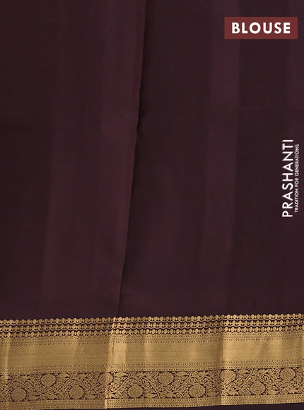 Pure soft silk saree peacock green and coffee brown with allover zari woven buttas and rich zari woven border