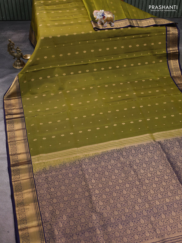 Pure soft silk saree mehendi green and navy blue with allover zari woven buttas and rich zari woven border