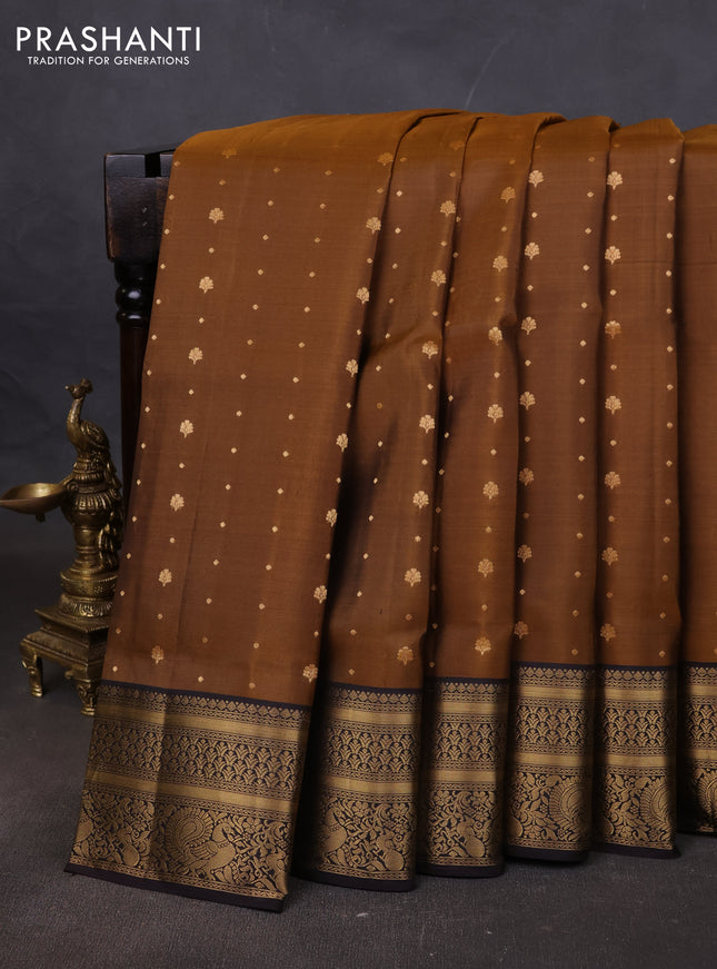 Pure soft silk saree dark mustard and coffee brown with allover zari woven buttas and zari woven annam border