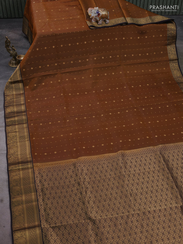 Pure soft silk saree dark mustard and coffee brown with allover zari woven buttas and zari woven annam border