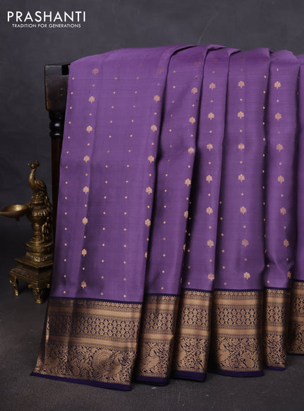 Pure soft silk saree lavender shade and dark blue with allover zari woven buttas and zari woven annam border