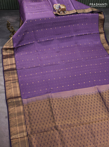 Pure soft silk saree lavender shade and dark blue with allover zari woven buttas and zari woven annam border
