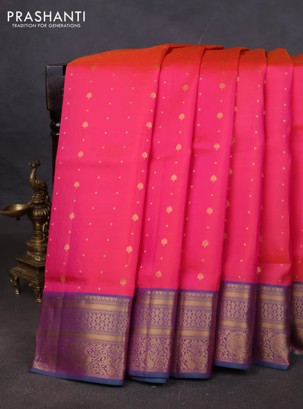 Pure soft silk saree dual shade of pinkish orange and teal green with allover zari woven buttas and zari woven annam border