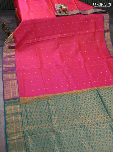 Pure soft silk saree dual shade of pinkish orange and teal green with allover zari woven buttas and zari woven annam border