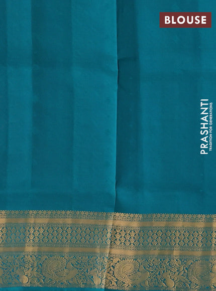 Pure soft silk saree dual shade of pinkish orange and teal green with allover zari woven buttas and zari woven annam border