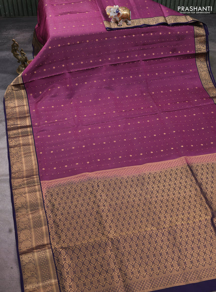 Pure soft silk saree purple and navy blue with allover zari woven buttas and zari woven annam border