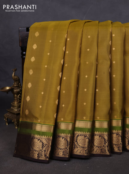 Pure soft silk saree mehendi green and coffee brown with allover zari woven buttas and zari woven floral border