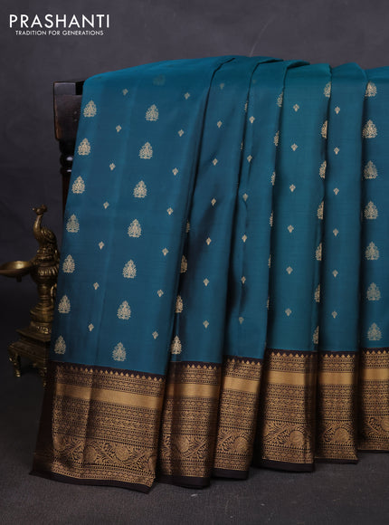 Pure soft silk saree peacock green and coffee brown with allover zari woven buttas and rich zari woven border