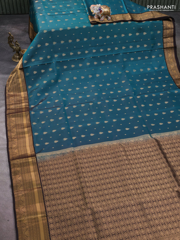 Pure soft silk saree peacock green and coffee brown with allover zari woven buttas and rich zari woven border